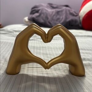 Gold Heart-Shaped Hand Sculpture